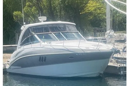 Slide: The Image of 2011 Cruisers Yachts 360 Express docked, featuring sleek design and modern amenities. - 1