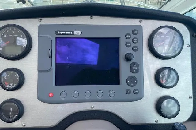 Slide: The Image of Dashboard of 2011 Cruisers Yachts 360 Express with Raymarine navigation system. - 13