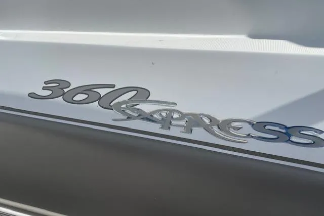 Slide: The Image of 2011 Cruisers Yachts 360 Express logo on white boat exterior. - 2