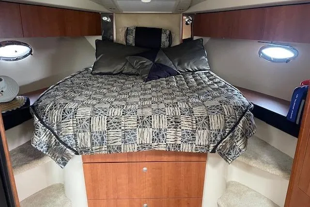 Slide: The Image of Luxurious cabin interior of 2011 Cruisers Yachts 360 Express with stylish bedding. - 20