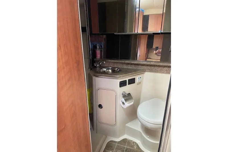 Slide: The Image of Bathroom interior of 2011 Cruisers Yachts 360 Express, featuring sink and toilet. - 39