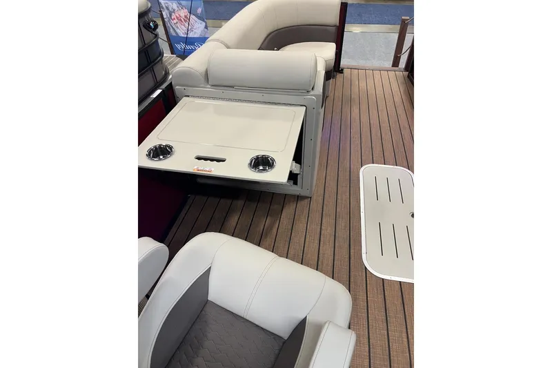 Slide: The Image of Interior of 2026 Bentley Pontoons 223 ELITE ADMIRAL with luxurious seating and wooden flooring. - 5