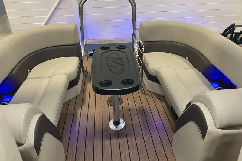 Slide: The Image of 2026 Bentley Pontoons 223 Elite Admiral interior with luxurious seating and modern design. - 6
