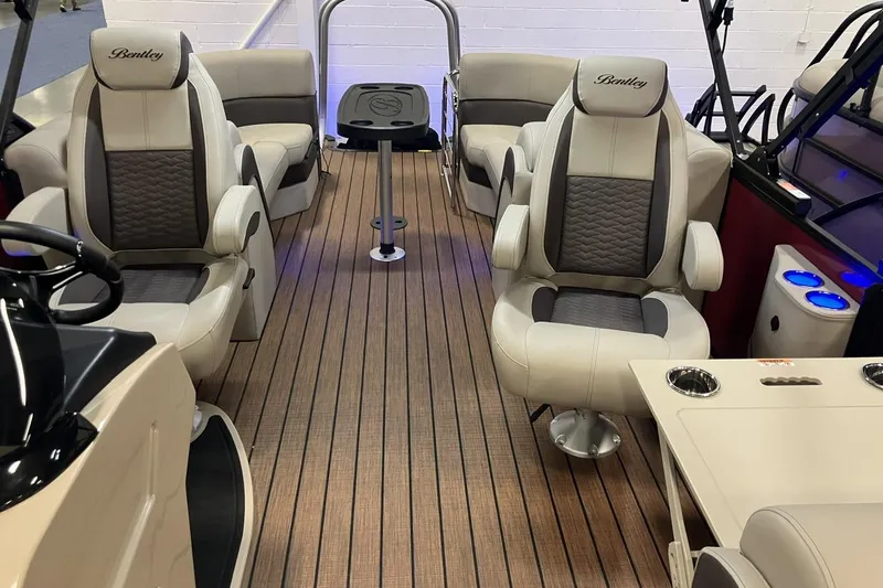Slide: The Image of 2026 Bentley Pontoons 223 Elite Admiral interior with luxurious seating and modern design. - 8