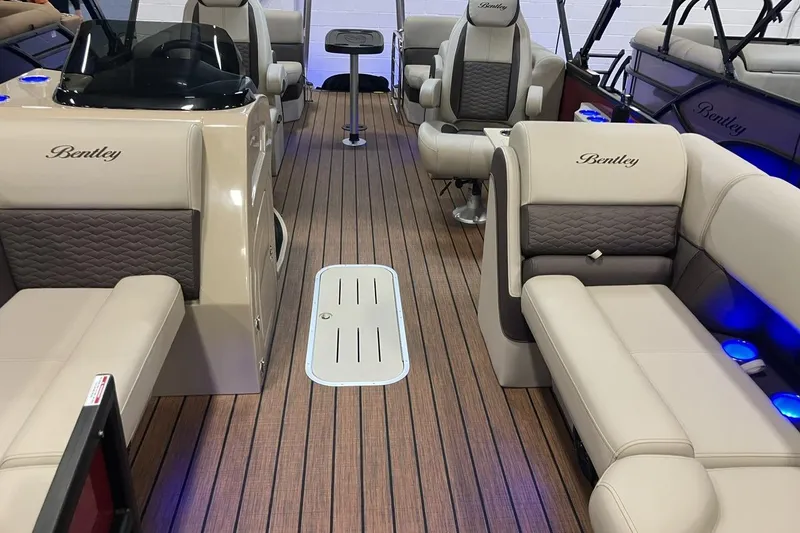 Slide: The Image of 2026 Bentley Pontoons 223 Elite Admiral interior with luxurious seating and modern design. - 9