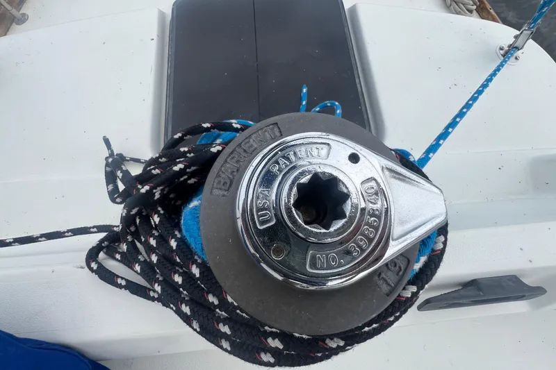 Slide: The Image of Winch on 1985 C&C Landfall 39 sailboat with coiled rope. - 14