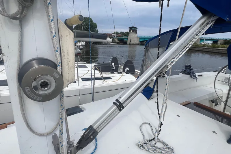 Slide: The Image of 1985 C&C Landfall 39 sailboat deck with rigging and marina view. - 21