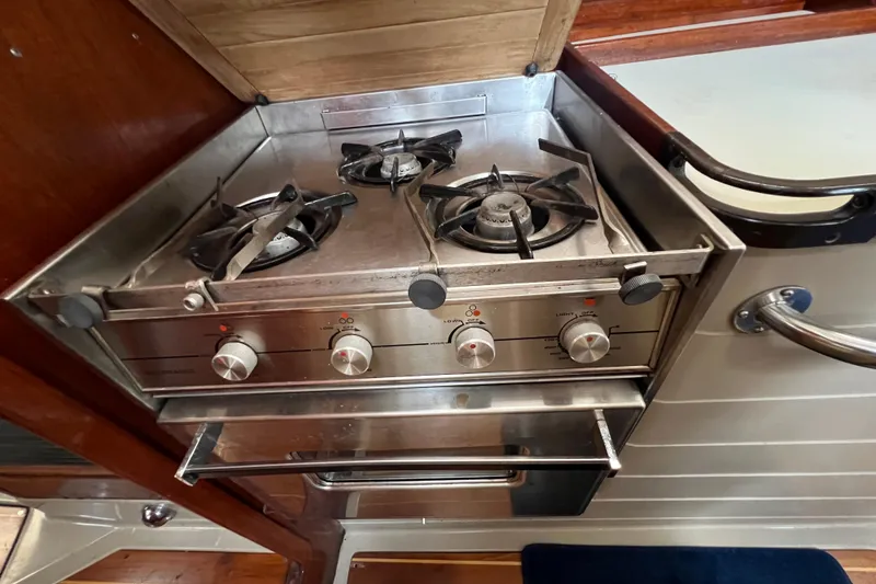 Slide: The Image of Stainless steel stove in 1985 C&C Landfall 39 yacht kitchen. - 36