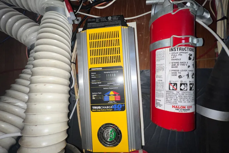 Slide: The Image of Battery charger and fire extinguisher in 1985 C&C Landfall 39 yacht. - 47