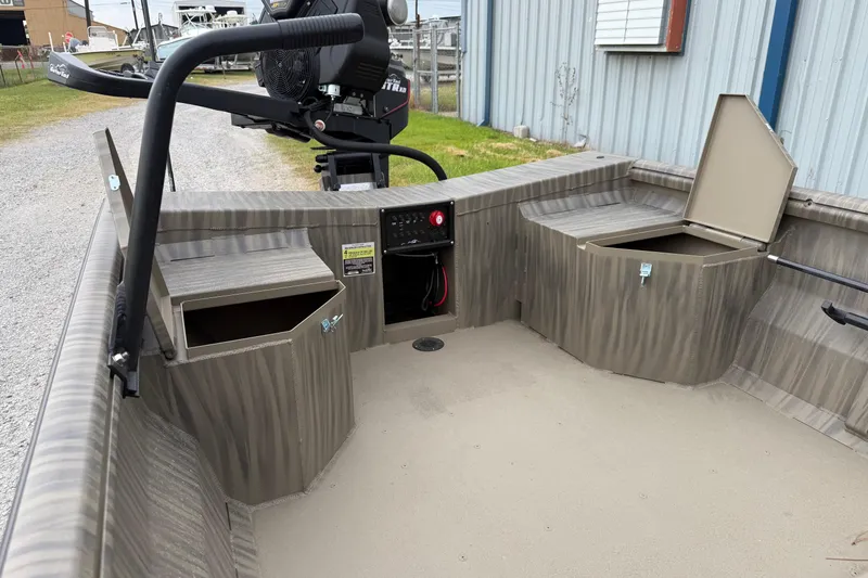 Slide: The Image of 2026 Gator Tail 1754 Extreme boat interior with storage compartments and motor. - 6