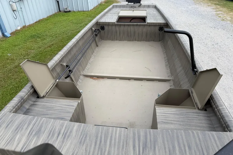 Slide: The Image of 2026 Gator Tail 1754 Extreme boat interior with open storage compartments. - 7