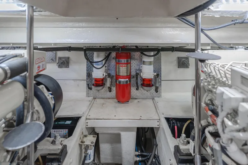 Slide: The Image of Engine room of 2004 Tiara Yachts 4000 Express, featuring fire suppression system. - 24