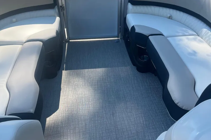 Slide: The Image of Luxurious interior of 2026 Avalon 23 LSZ Elite pontoon boat with plush seating. - 5