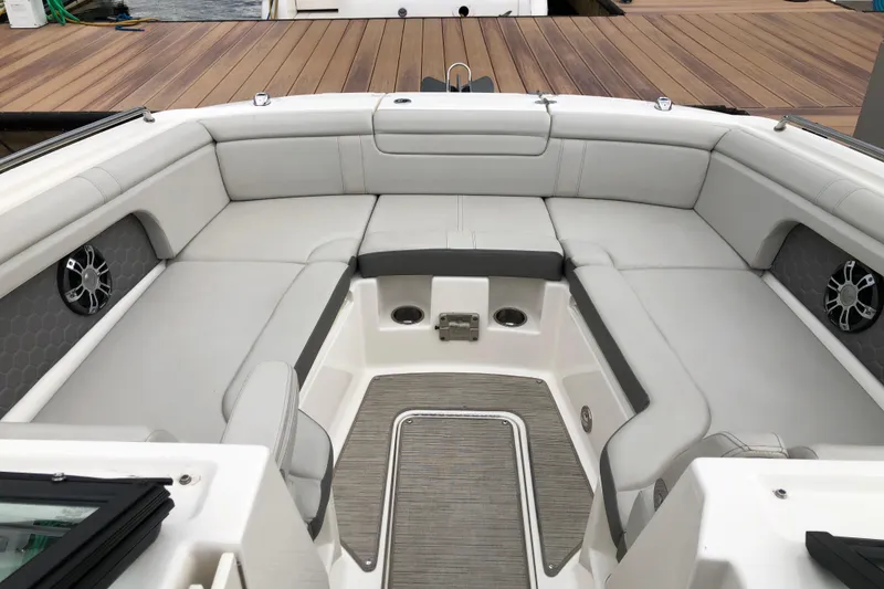 Slide: The Image of 2020 Sea Ray SDX 290 boat interior with spacious seating and modern design. - 12