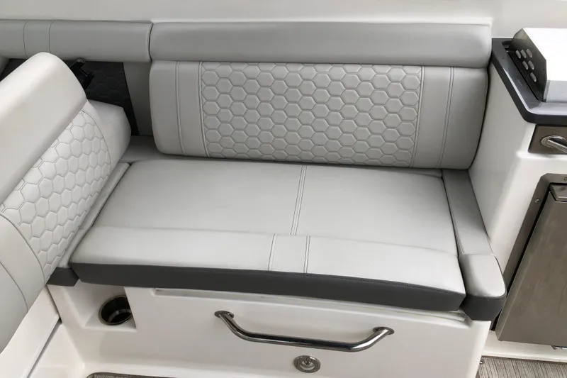 Slide: The Image of Luxurious seating on 2020 Sea Ray SDX 290 boat with hexagonal pattern upholstery. - 7