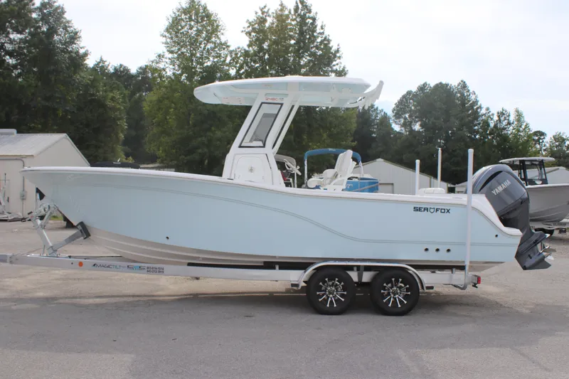 The Image of 2026 Sea Fox 248 Commander boat on trailer, side view, outdoors. - 0