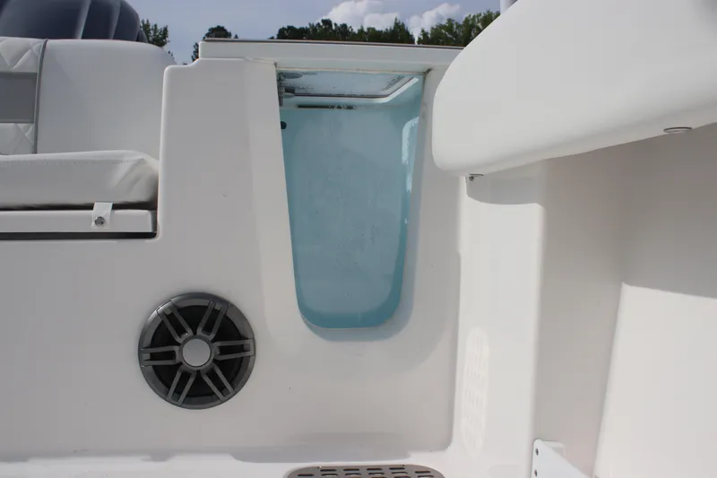 Slide: The Image of 2026 Sea Fox 248 Commander boat interior with speaker and storage compartment. - 13