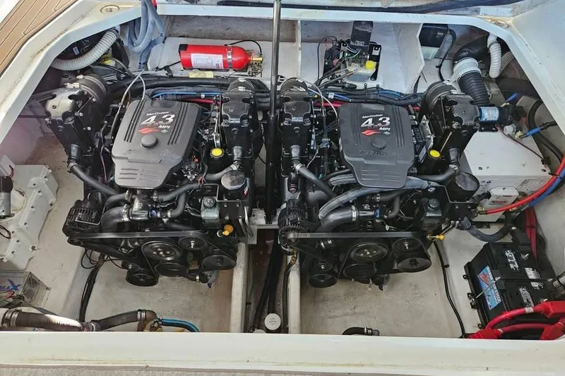 Slide: The Image of Engine compartment of a 2006 Sea Ray 290 Sundancer with twin MerCruiser 4.3 MPI engines. - 18