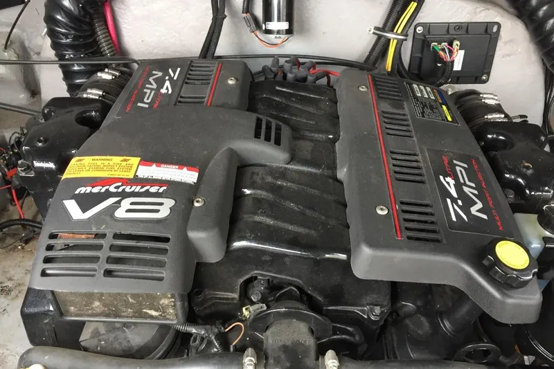 Slide: The Image of MerCruiser V8 engine in 1999 Chaparral 2830 SS boat, featuring 7.4 MPI technology. - 14