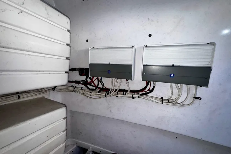 Slide: The Image of Electrical wiring and components inside a 2006 Donzi 32 ZF boat. - 16