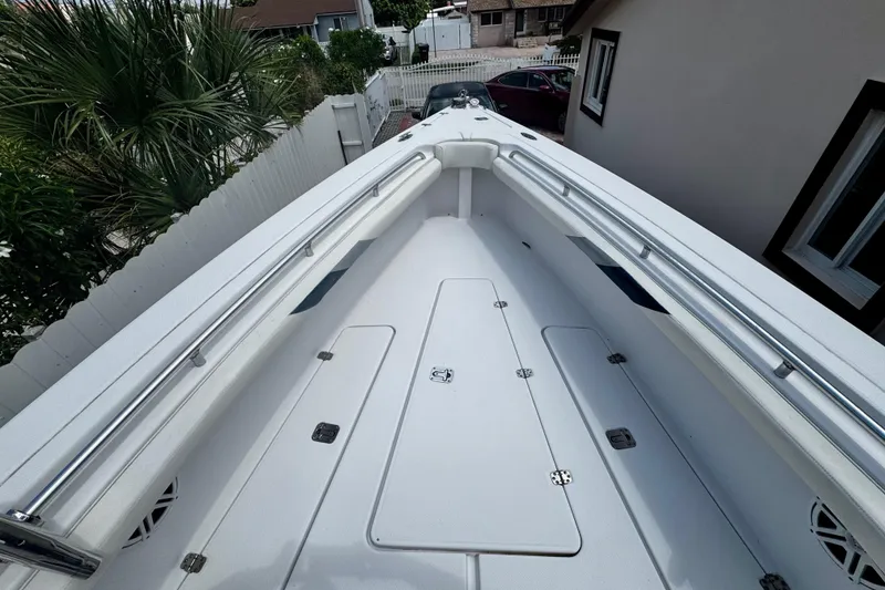 Slide: The Image of 2006 Donzi 32 ZF boat deck, featuring sleek design and spacious layout. - 21
