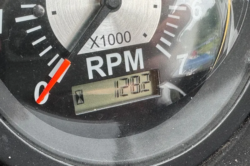 Slide: The Image of Close-up of a 2017 JC SportToon 24TT tachometer displaying 1202 RPM. - 11