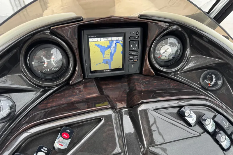 Slide: The Image of Dashboard of 2017 JC SportToon 24TT with GPS, gauges, and controls. - 12