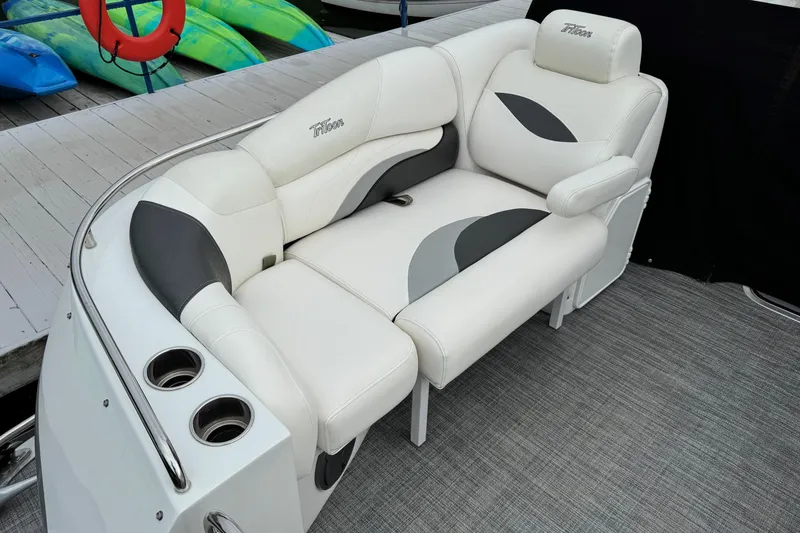 Slide: The Image of Luxurious seating on 2017 JC SportToon 24TT boat with cup holders and stylish design. - 5