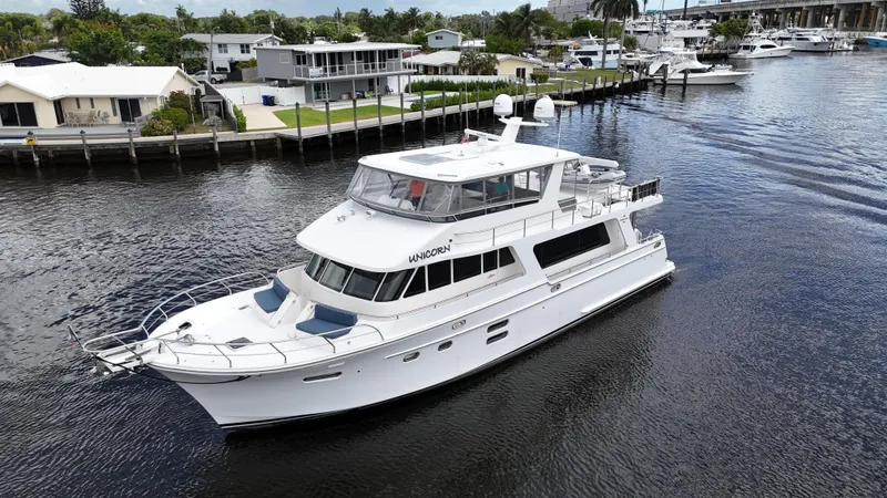 Slide: The Image of Luxury yacht Hampton 658l Endurance 2020 cruising on a serene waterway. - 0