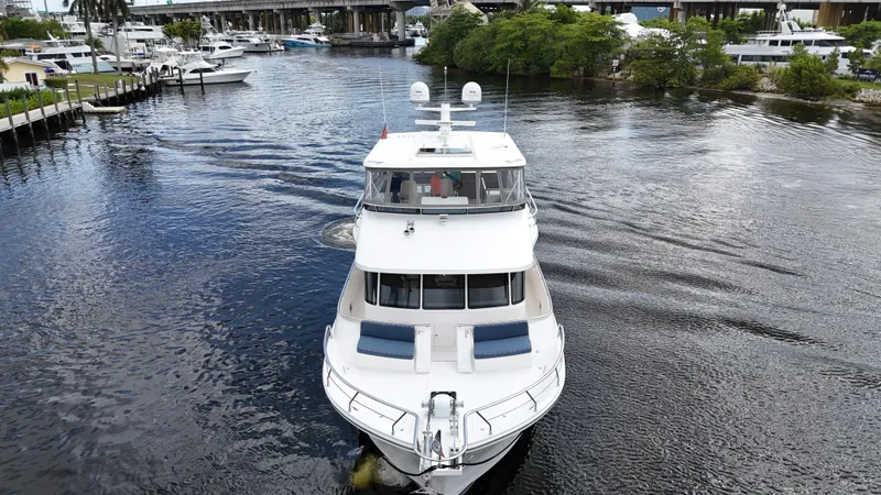 Slide: The Image of 2020 Hampton 658l Endurance yacht cruising on a scenic waterway. - 1