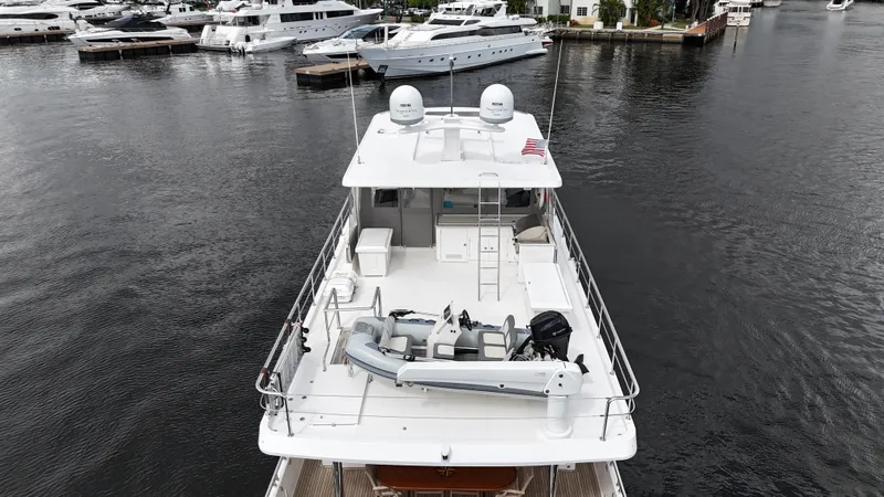 Slide: The Image of 2020 Hampton 658l Endurance yacht docked at marina, aerial view. - 34