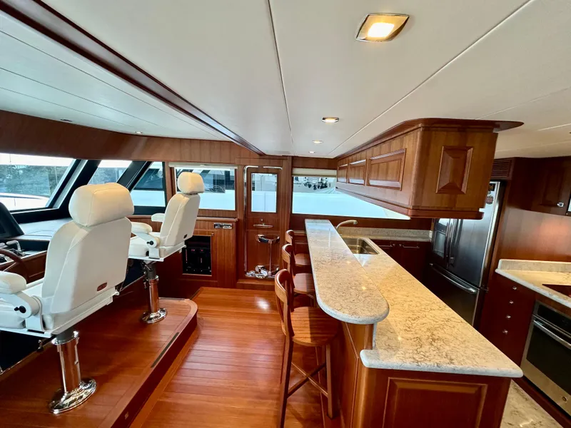 Slide: The Image of Luxurious interior of 2020 Hampton 658l Endurance yacht with elegant wood finishes. - 83