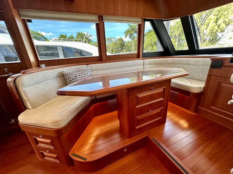 Slide: The Image of Luxurious interior of 2020 Hampton 658l Endurance yacht with elegant wood finish and seating area. - 89
