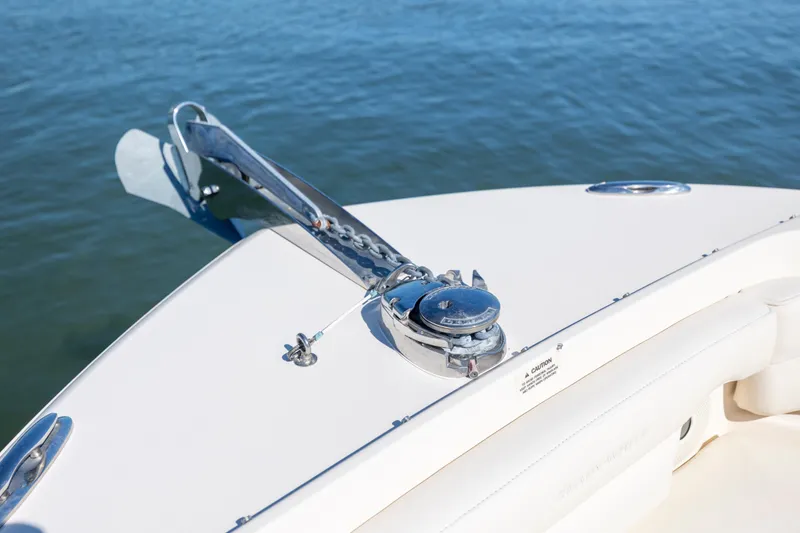 Slide: The Image of 2017 Grady-White Freedom 235 boat anchor system on calm water. - 23