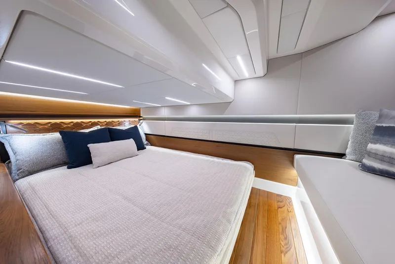 Slide: The Image of Manufacturer Provided Image: Luxurious interior of 2025 Tiara Yachts 43 LE, featuring a modern bedroom design. - 14