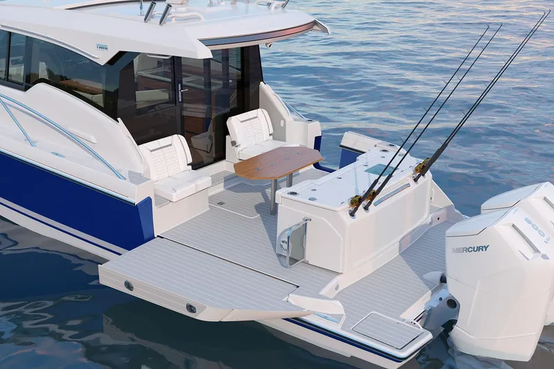 Slide: The Image of Manufacturer Provided Image: 2025 Tiara Yachts 43 LE with fishing rods and seating on calm water. - 17