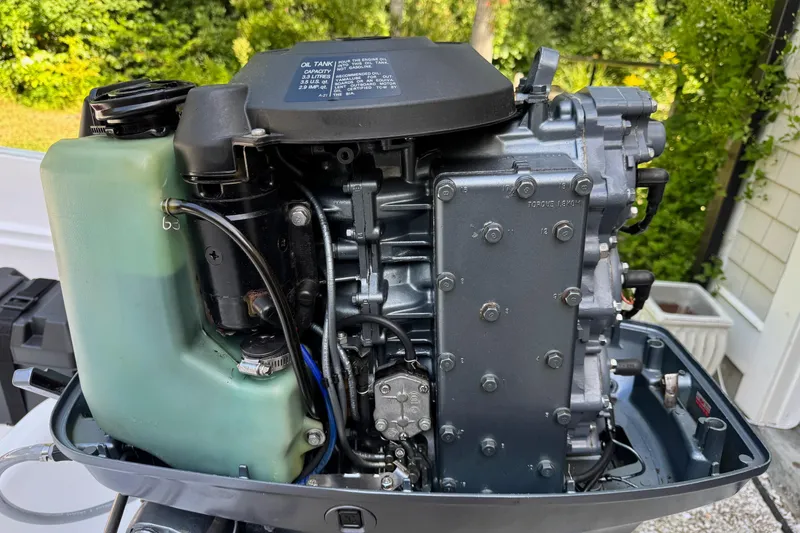Slide: The Image of Close-up of a 1978 Boston Whaler Currituck engine, showcasing detailed components. - 7