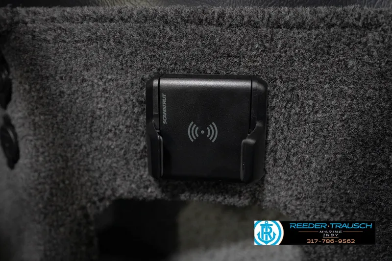 Slide: The Image of 2026 Lund 1875 Impact XS boat interior with Scanstrut wireless charging pad. - 40