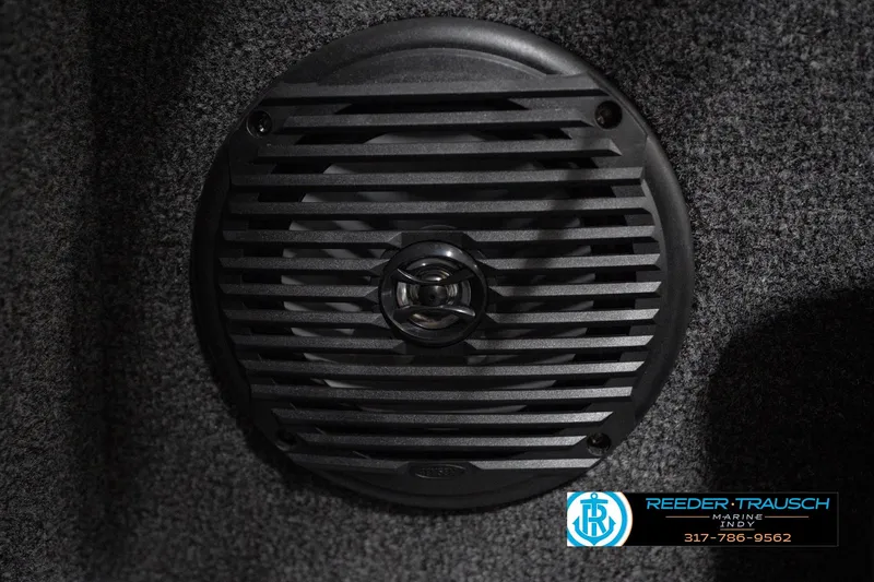 Slide: The Image of Speaker in 2026 Lund 1875 Impact XS boat interior, Reeder-Trausch Marine logo visible. - 47