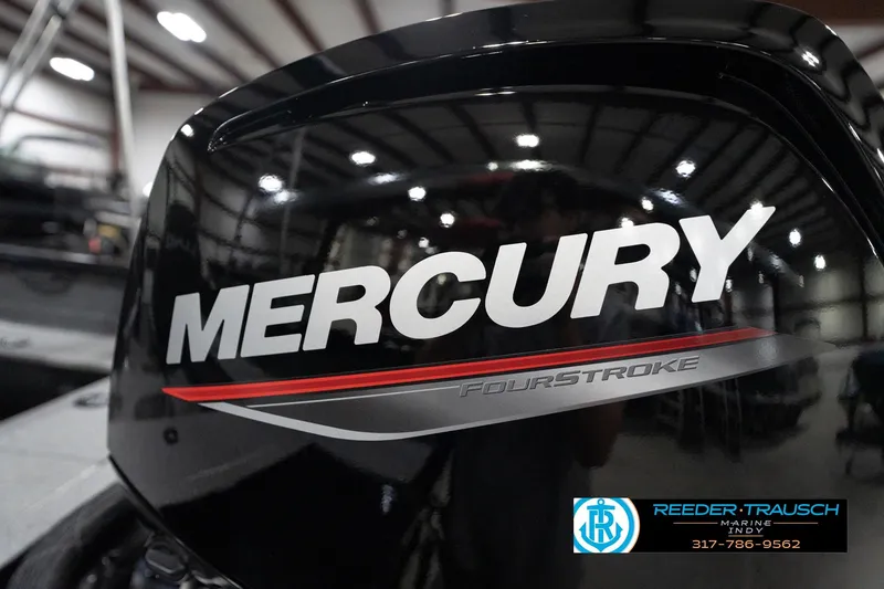 Slide: The Image of Mercury FourStroke engine on 2026 Lund 1800 Explorer Sport boat in showroom. - 104