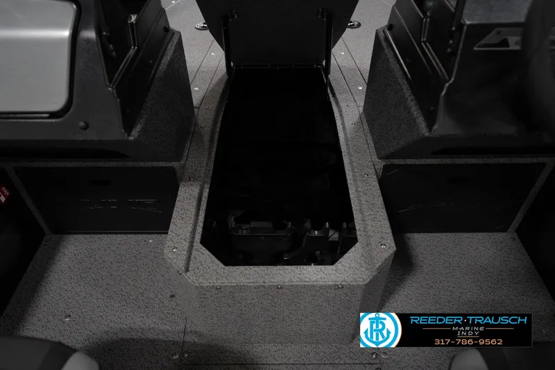Slide: The Image of 2026 Lund 1800 Explorer Sport boat interior with motor, showcased at Reeder-Trausch Marine. - 28