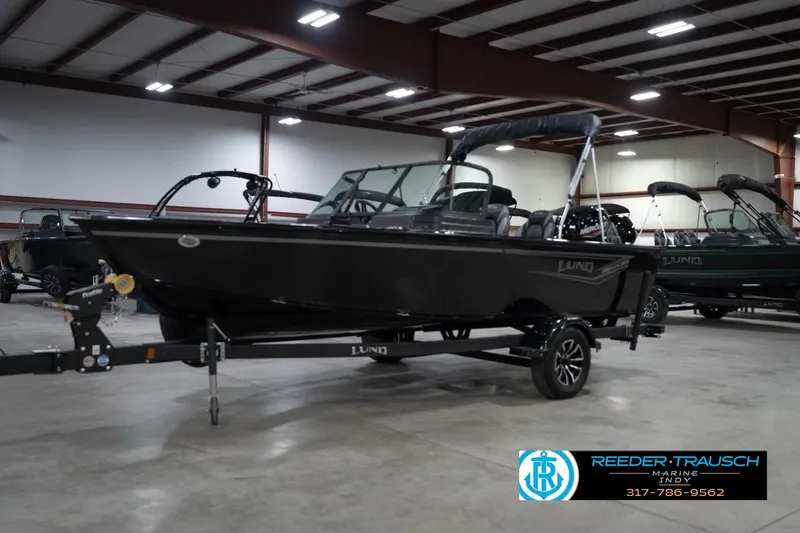 Slide: The Image of 2026 Lund 1800 Explorer Sport boat with people enjoying on-water delivery service. - 3