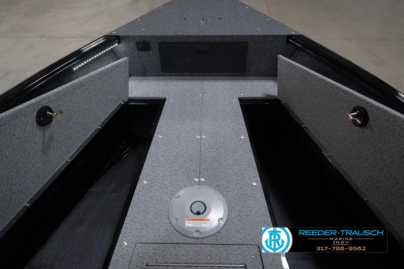Slide: The Image of Interior view of 2026 Lund 1800 Explorer Sport boat dashboard in a showroom. - 30