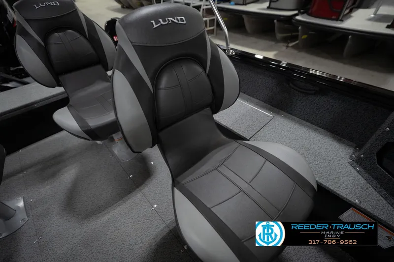 Slide: The Image of Dashboard controls of 2026 Lund 1800 Explorer Sport boat with gauges and switches. - 41