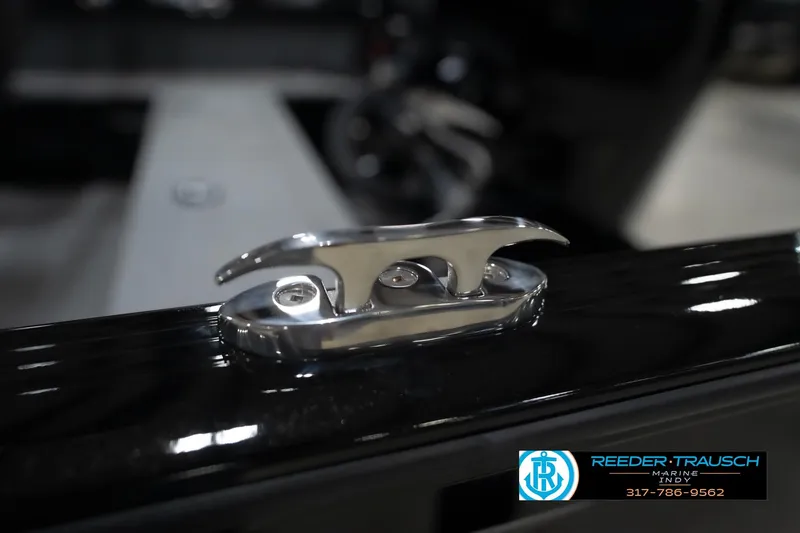 Slide: The Image of Trailer hitch of 2026 Lund 1800 Explorer Sport in a showroom setting. - 58