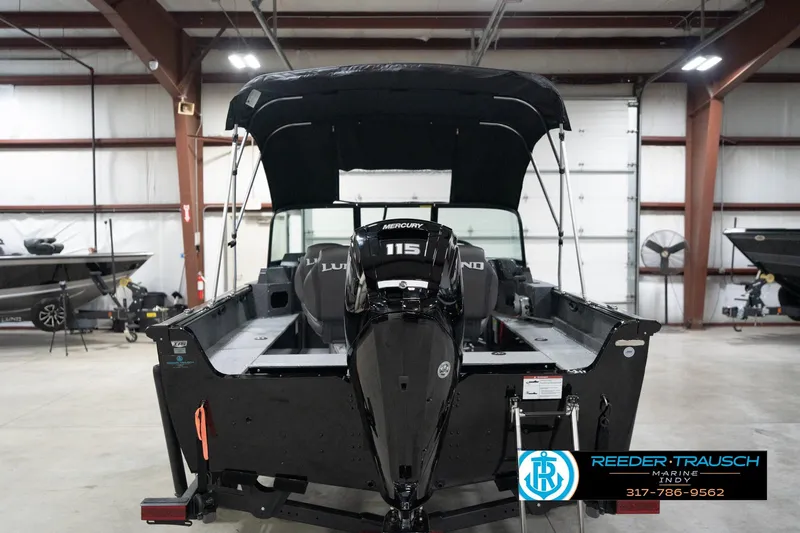 Slide: The Image of 2026 Lund 1800 Explorer Sport boat with Mercury 115 engine in showroom. - 67