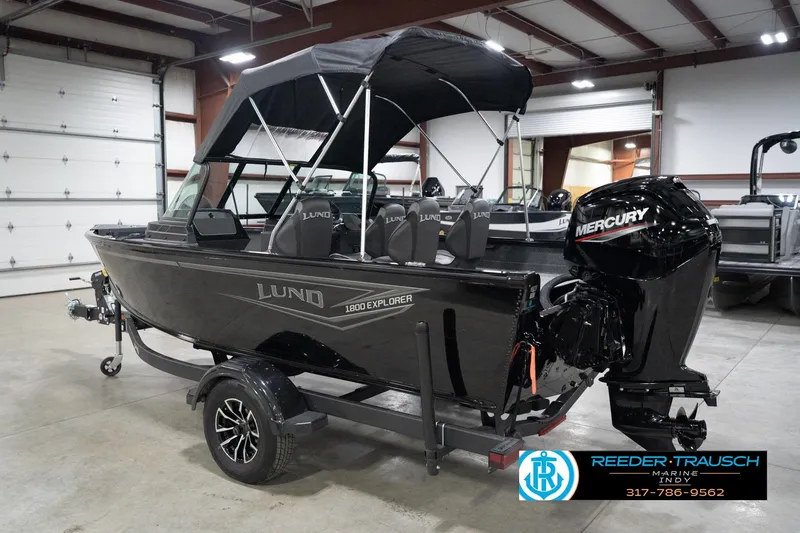 Slide: The Image of 2026 Lund 1800 Explorer Sport boat with Mercury engine in showroom. - 68