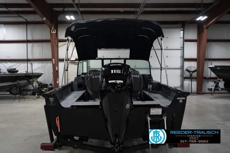 Slide: The Image of 2026 Lund 1800 Explorer Sport boat with Mercury 115 engine in showroom. - 9