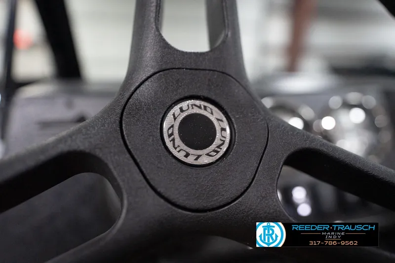 Slide: The Image of Close-up of 2026 Lund 1800 Explorer Sport steering wheel with logo. - 91