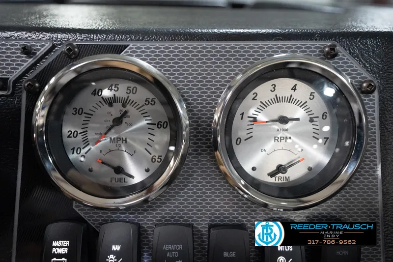 Slide: The Image of Dashboard of 2026 Lund 1800 Explorer Sport with speedometer and RPM gauges. - 92